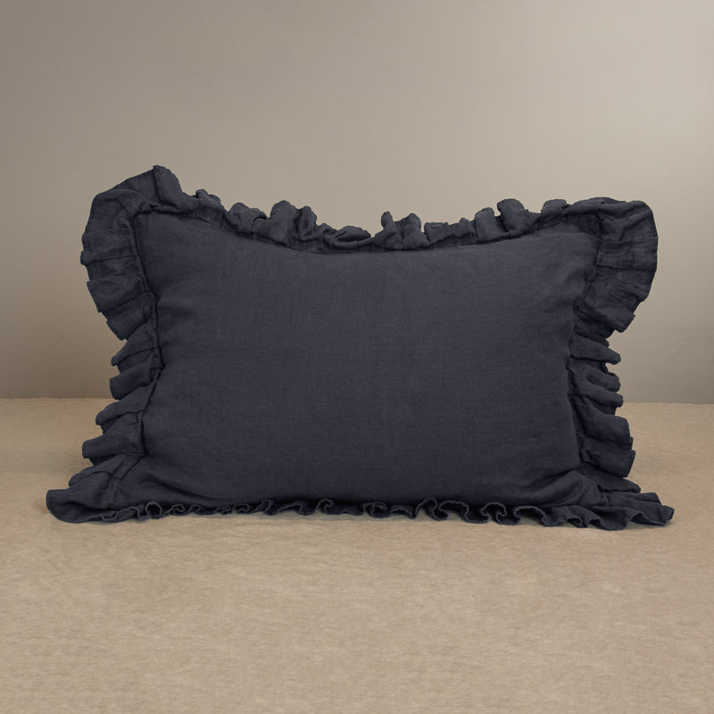 Linen pillow in anthracite gray pillowcase with ruffles