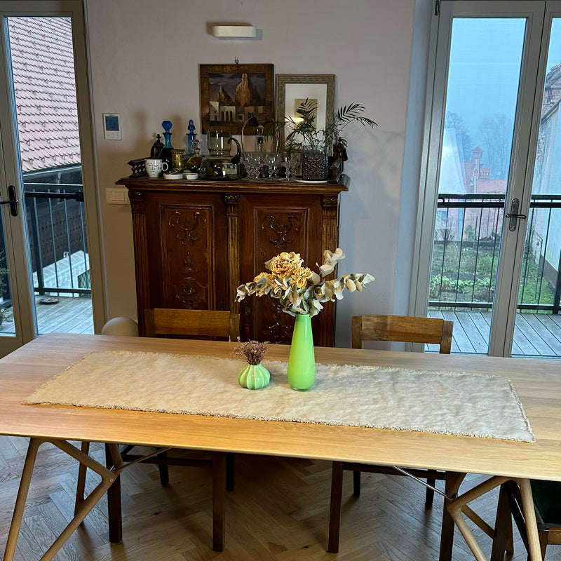 Brown Closet and Gray Linen table runner with flowers in green vases