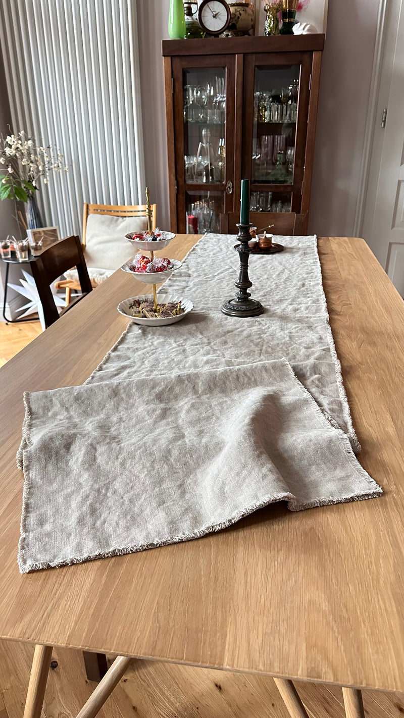 Cupboard with dishes, Table runner on wooden table